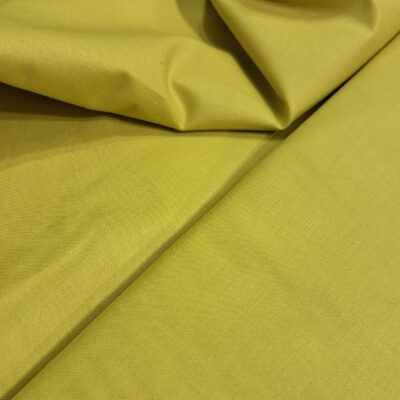 אריג כותנה רחב בצבע ירוק צהבהב